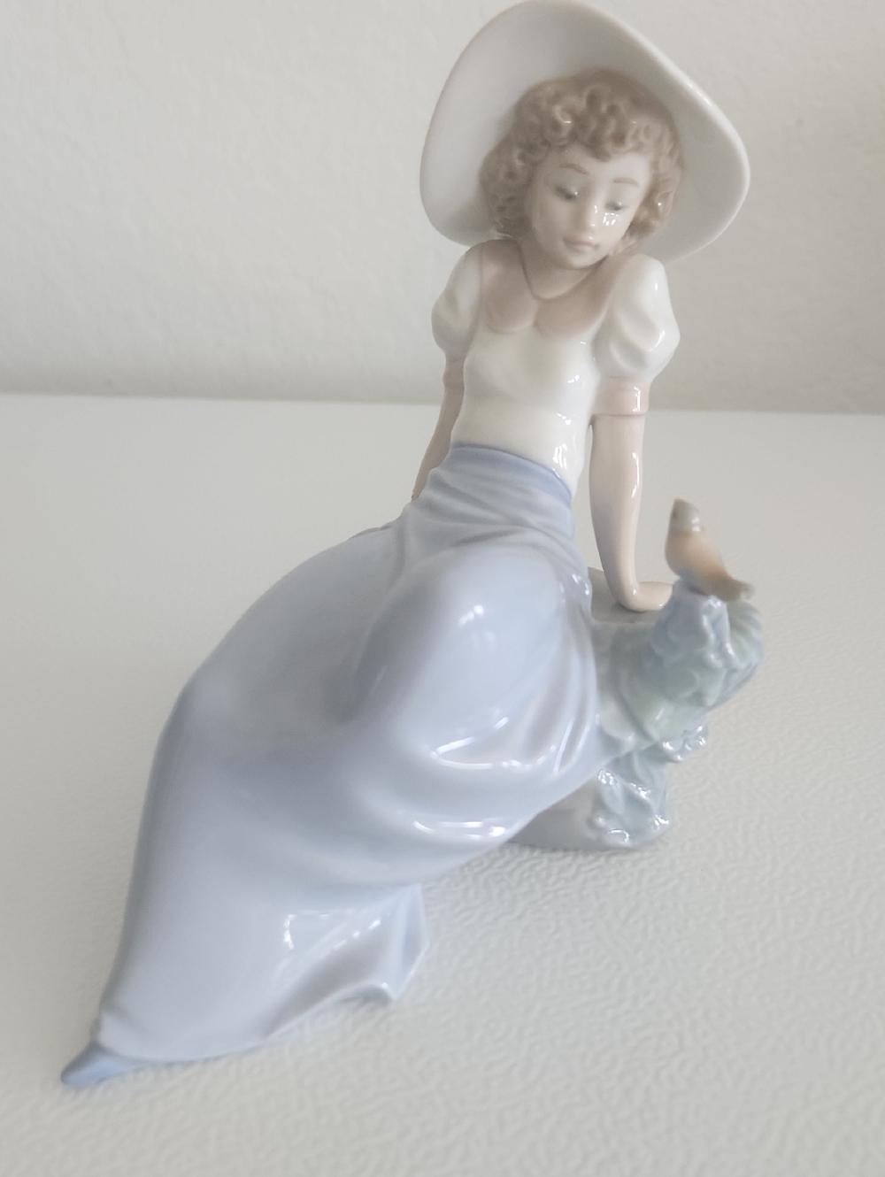 Lladro Porcelain Seated Lady in Light Blue Skirt with Cream Hat